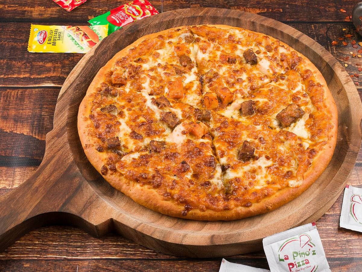 BBQ Chicken — Grilled chicken, BBQ sauce, red onion, mozzarella