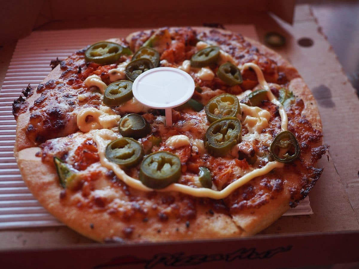 Buffalo Chicken — Spicy buffalo chicken, ranch drizzle, mozzarella