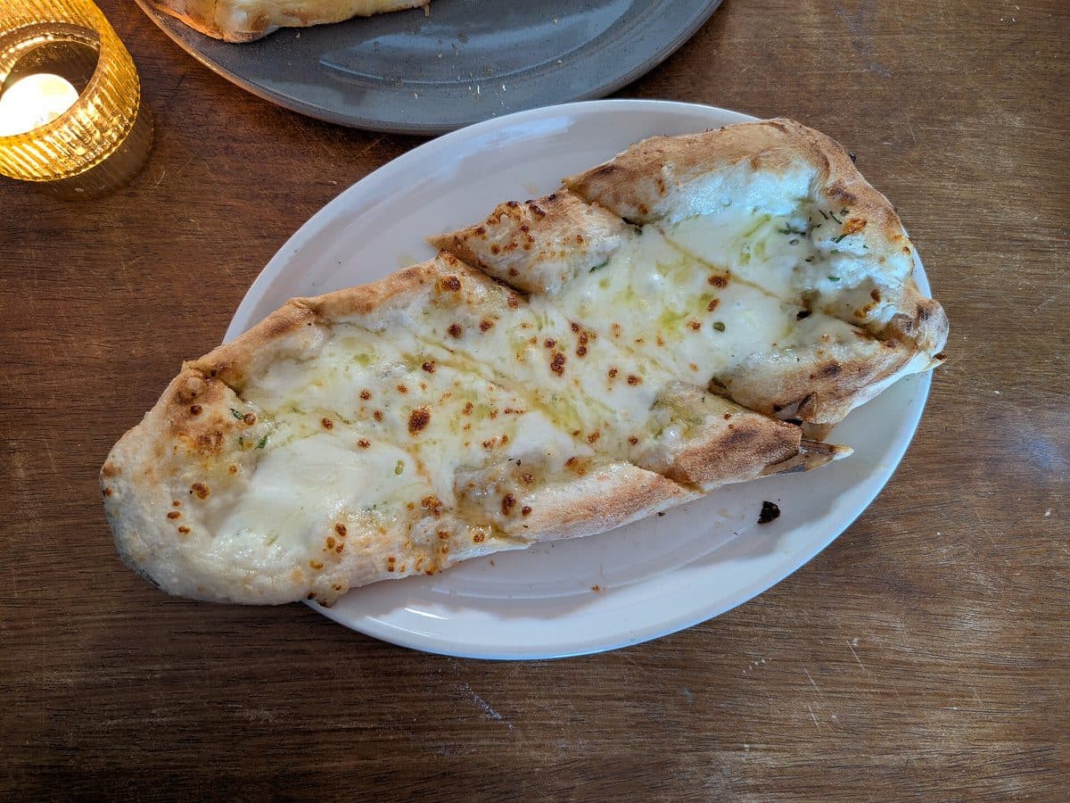 Cheesy Garlic Bread — Garlic bread topped with melted mozzarella