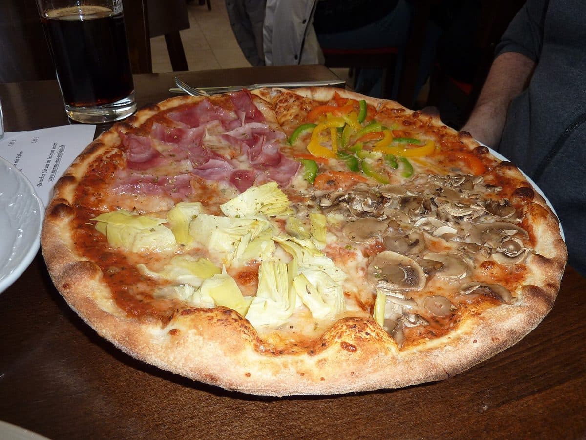 Four Seasons — Mushroom, ham, artichoke, olives, mozzarella
