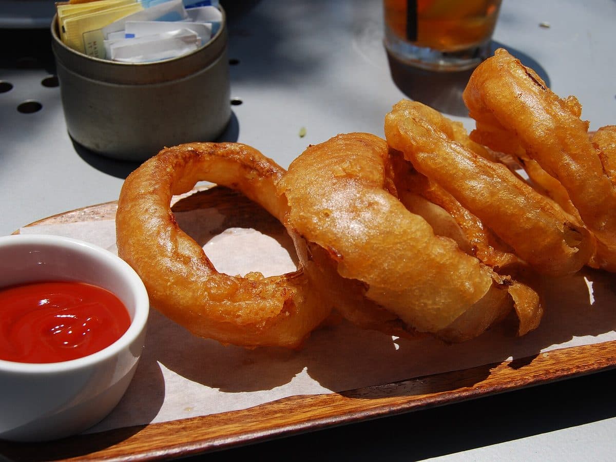 Onion Rings — Crispy battered onion rings, served with dip